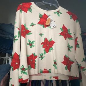 long sleeve cream colored shirt,with roses as it’s print from forever 21.